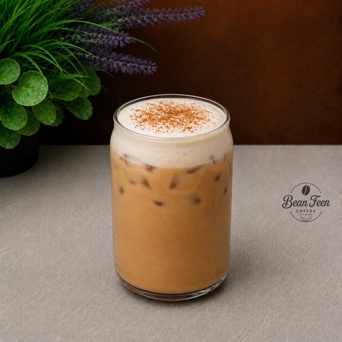 Iced pumpkin latte with salted pumpkin cold foam and spice topping from Bean Feen Coffee